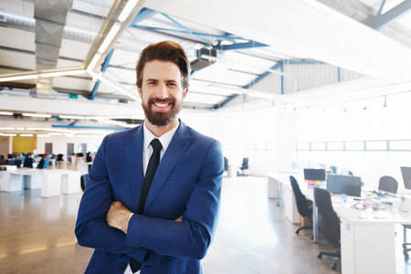 Portrait of a confident and successful young businessman working in a modern office