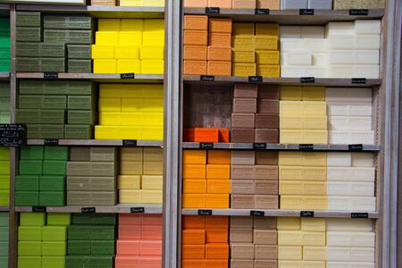 Bars of scented soap at market stall in provence province, franceの写真素材