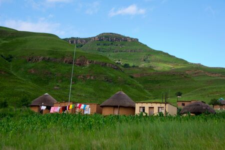 rural homestead in drakensberg mountains, kwazulu natal, south africaの写真素材