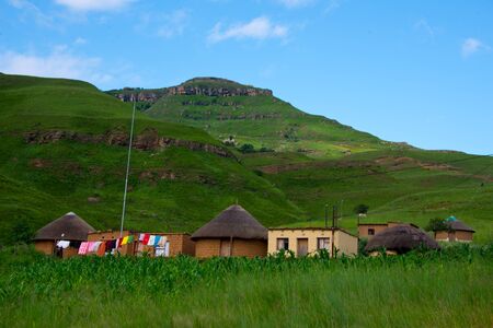 rural homestead in drakensberg mountains, kwazulu natal, south africaの写真素材
