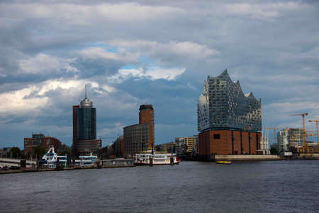 elbphilharmonie concert hall, hamburg, germany, seen from riverside commuter's ferry viewpointのeditorial素材