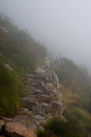 foggy footpath on platteklip gorge, table mountain, cape town, south africaの写真素材