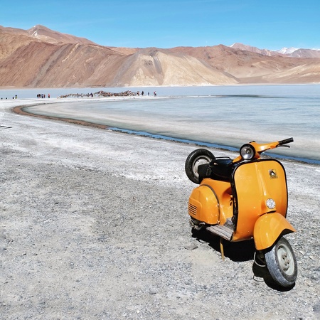 Yellow vespa in Pangong lakeÂ is situated in the Himalayas Â inÂ LadakhÂ City.のeditorial素材