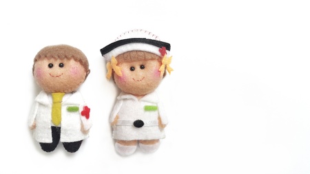 Doll  doctor and nurse,  on white background.infirmary,clinic,patient care,hospitalの写真素材