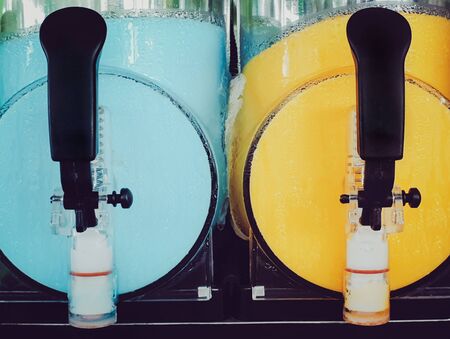 Juice slush machine for refreshing summer in Minimart.の写真素材