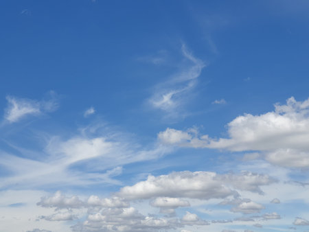 soft clouds and azure sky background.The atmosphere in the blue sky with copy space .The weather is...