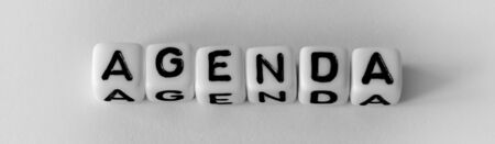 Word AGENDA build with with cubes and black lettersの写真素材