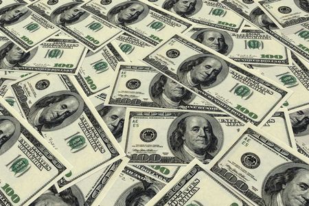 Background image of U.S. hundred dollar bills.
