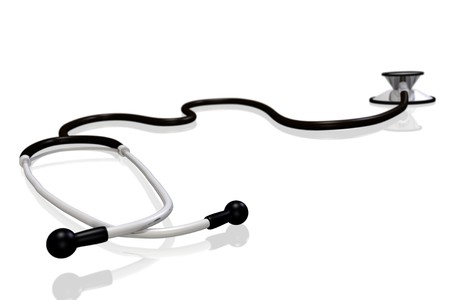Image of a silver and black stethoscope isolated on a white background.の写真素材