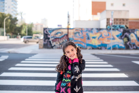 Little girl on vacation posing for the photographerのeditorial素材