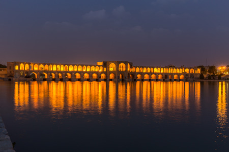 ISFAHAN IRAN APRIL 28 2015: unidentified people resting in the ancient Khaju Khaju Pole Bridge in Isfahan Iranのeditorial素材