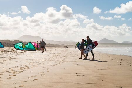 LANZAROTE, SPAIN - NOVEMBER 28, 2016: Kitesurfing in Caleta de Famara, in Lanzarote, Canary Islands, in Spainのeditorial素材