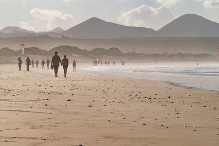 LANZAROTE, SPAIN - NOVEMBER 28, 2016: Kitesurfing in Caleta de Famara, in Lanzarote, Canary Islands, in Spainのeditorial素材