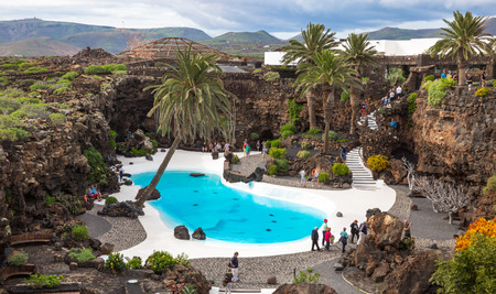 LANZAROTE, SPAIN - NOVEMBER 29, 2016: people at the Jameos del Agua, part of a 6Km long lava tube which formed about 4,000 years ago when the Montana La Corona erupted. The tourist attraction was conceived by Cesar Manrique, during the 1960's in Lanzaroteのeditorial素材