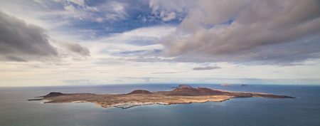 View of Isla Graciosa from Mirador del Rio, in Lanzarote, Canary Islands, Spain. In 1973 Cesar Manrique converted the gun emplacement into a spectacular lookout point.の写真素材