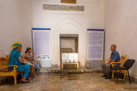 BUKHARA, UZBEKISTAN - AUGUST 26, 2016: people at the Chashma Ayub Mausoleum in Bukhara, Uzbekistan.のeditorial素材