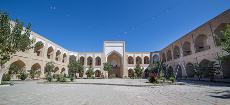 View of Kukeldash Medressa, in Bukhara,  Uzbekistan. The Kukeldash madrasah, built in 1569 by Abdullah II, was at the time the biggest Islamic school in Central Asia.のeditorial素材