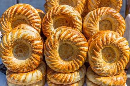 The typical traditional bread for sale in the Chorsu bazaar in Tashkent, Uzbekistanの写真素材