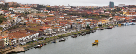 Panoramic view of Douro river and Vila Nova de Gaia from the quarter of Ribeira, Porto, in Portugalのeditorial素材