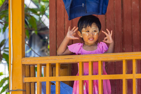 NGAPALI, MYANMAR - DECEMBER 03, 2014: children in Thandwe village, Ngapali beach, Myanmarのeditorial素材