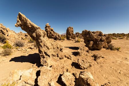 Spectacular rock formations in the desert along the scenic route from Salar de Uyuni to the lagoons of southern Boliviaの写真素材