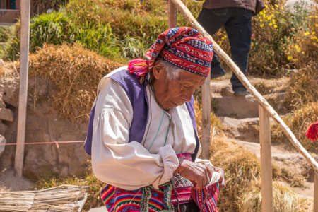 Taquile, Peru - september 27, 2018: man in Taquile Island in Lake Titicaca, Peru.