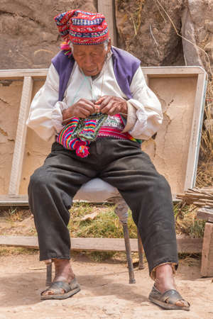 Taquile, Peru - september 27, 2018: man in Taquile Island in Lake Titicaca, Peru.のeditorial素材