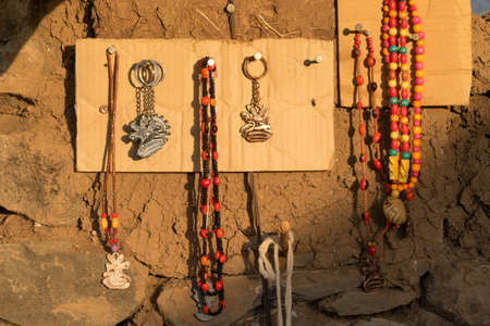 Craft market with handmade alpaca textile products at the archaelogical Site of Sillustani on the...