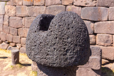 Inca prehistoric ruins in Chucuito near Puno, Titicaca lake area. This photo present stone phallus...