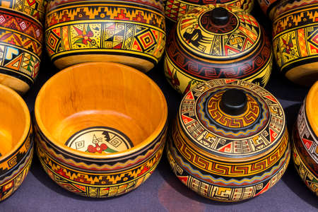 Colorful pottery in a craft market of Pisac, near Cusco, in Peru