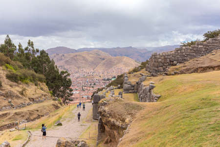 Cusco, Peru - october 07, 2018: View of tourists walking at Sacsayhuaman fortress, Inca ruins in Cusco or Cuzco town, Peruのeditorial素材