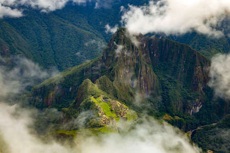 View from the top of Machu Picchu mountain, 3,082 masl, where you can glimpse entire landscape of the Inca ruins at 2,430 masl.のeditorial素材