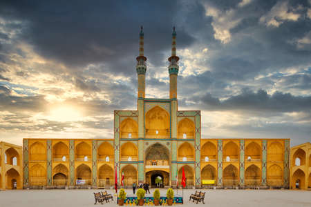 YAZD, IRAN - APRIL 27, 2015: unidentified people resting near the Amir Chakhmaq Complex in Yazd, Iranのeditorial素材