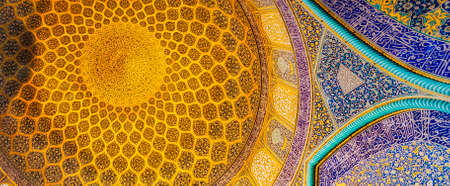 Isfahan, Iran - April 29, 2015: Interior of the dome and central hall of the Sheikh Lotfollah Mosque in persian style. The Mosque built in 1619 and now is a UNESCO World Heritage Site.のeditorial素材
