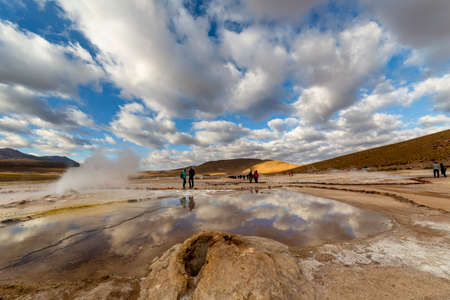 San Pedro de Atacama, Chile - October 14, 2019: people watch amazing El Tatio geysers at sunrise, near San Pedro de Atacama, Chile.のeditorial素材