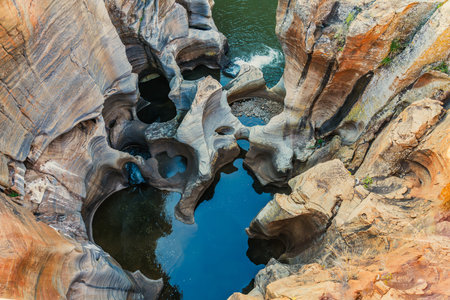 Bourke's Luck Potholes, popular geological attraction formed by water erosion, with walkways & bridges for visitors, in South Africaの写真素材