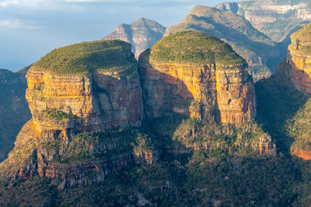 Three Rondavels, three round mountain tops with slightly pointed tops, very similar to the traditional round or oval African homesteads called rondavels, in Mpumalanga, South Africaの写真素材
