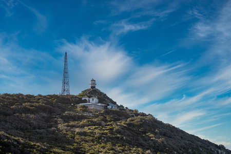 Lighthouse at Cape of Good Hope sign, Cape Peninsula, Western Cape, South Africaの写真素材