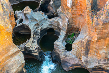 Bourke's Luck Potholes, popular geological attraction formed by water erosion, with walkways & bridges for visitors, in South Africaの写真素材