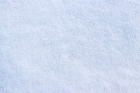 White winter snow flakes closeup backgroundの写真素材