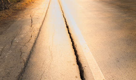 Groove of road damage Potentially dangerous for motorcyclists.の写真素材