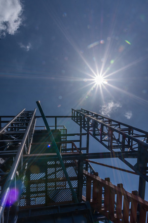 Wastewater treatment plant is made of steel structure. And sunlight on blue sky.の写真素材