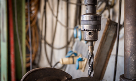Close-Up Drilling machine in factory workshop.の写真素材