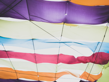 Abstract colorful fabric hanging on top to cover the sun in celebration.の写真素材