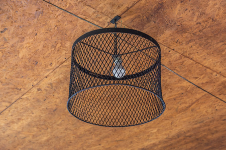 Lamp is made of black iron mesh Hang on the ceiling made of wood on top.The idea of bringing the...