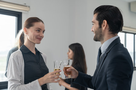 Business people drinking champagne to celebrate success of investment agreement after meeting, teamwork and partnership concept.の写真素材