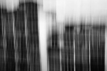 Abstract motion blur effect. Black and white image of urban landscape.の写真素材