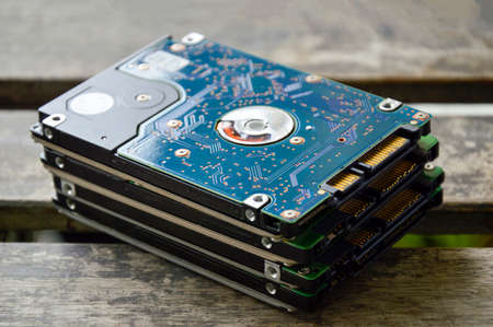 Image of a technician screwing the back of a mobile phone.の写真素材