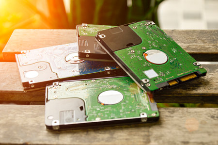 Image of a technician screwing the back of a mobile phone.の写真素材
