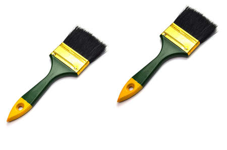 2 paint brushes placed on a white backgroundの写真素材